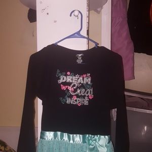 Black and teal dress with a black jacket connected